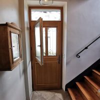 Ouvrant pour nettoyage vitrage sur porte d'entrée